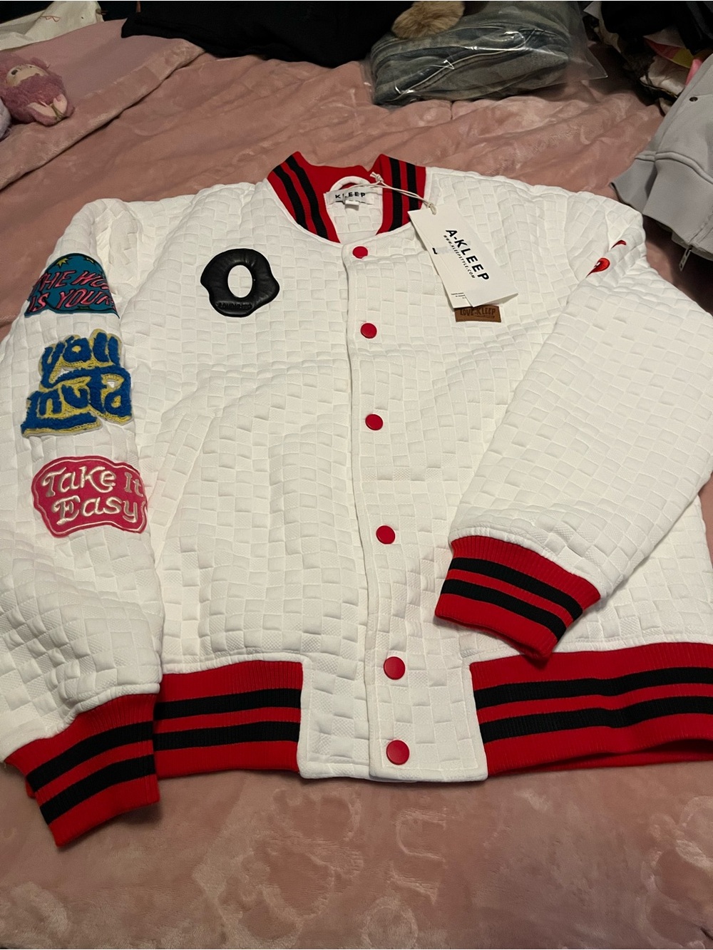 White Quilted Bomber Jacket with Red Trim